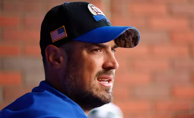 FILE - New York Giants offensive coordinator Mike Kafka talks to reporters before NFL football practice in East Rutherford, N.J., June 5, 2025. (AP Photo/Noah K. Murray, File)