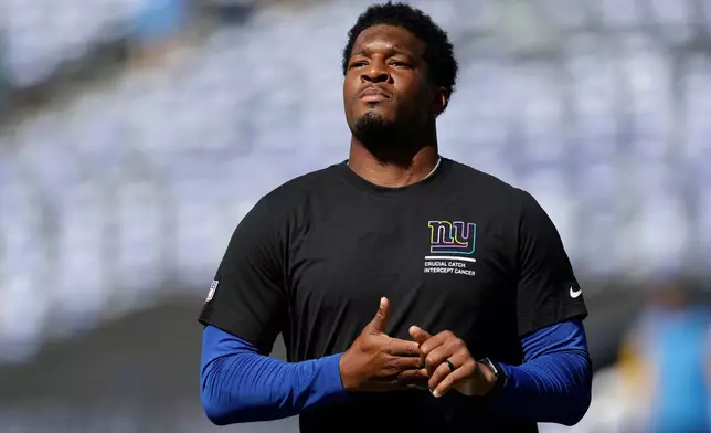 FILE - New York Giants quarterback Jameis Winston (19) warms up before an NFL football game against the Los Angeles Chargers, Sept. 28, 2025, in East Rutherford, N.J. (AP Photo/Adam Hunger, File)