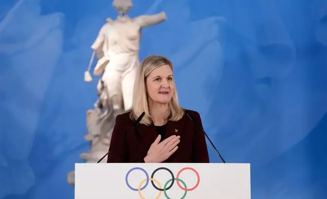 Kirsty Coventry, President of the International Olympic Committee, delivers a speech during the flame lighting ceremony for the Milan Cortina 2026 Winter Olympics, at the archaeological museum of Olympia, Greece, Wednesday, Nov. 26, 2025. (AP Photo/Thanassis Stavrakis)