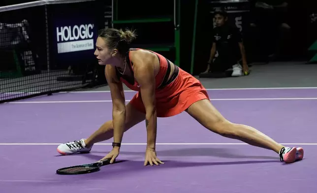 Aryna Sabalenka of Belarus reacts during the women's singles match against Coco Gauff of the United States at the WTA tennis finals in Riyadh, Saudi Arabia, Thursday, Nov. 6, 2025. (AP Photo/Fatima Shbair)
