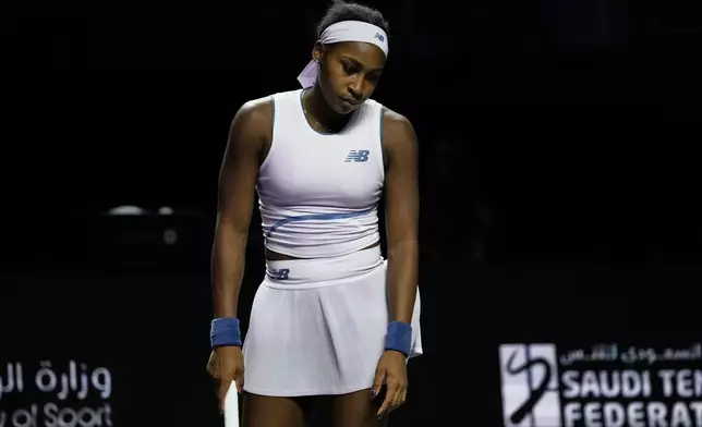 Coco Gauff of the United States reacts during the women's singles match against Aryna Sabalenka of Belarus at the WTA tennis finals in Riyadh, Saudi Arabia, Thursday, Nov. 6, 2025. (AP Photo/Fatima Shbair)