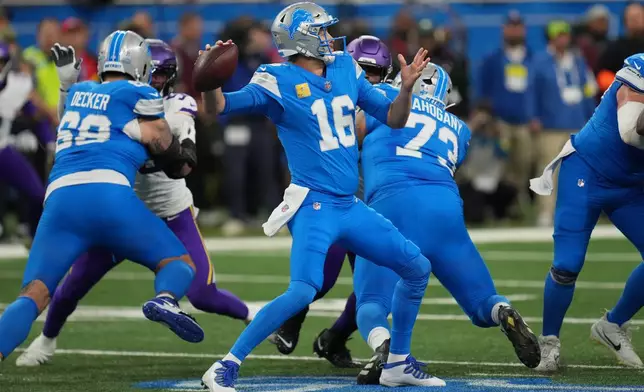 Detroit Lions quarterback Jared Goff (16) passes during the first half of an NFL football game against the Minnesota Vikings Sunday, Nov. 2, 2025, in Detroit. (AP Photo/Paul Sancya)