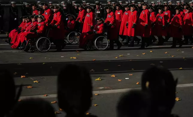 Chelsea Pensioners march during the Remembrance Sunday Service at the Cenotaph in London, Sunday, Nov. 9, 2025.(AP Photo/Alastair Grant, Pool)