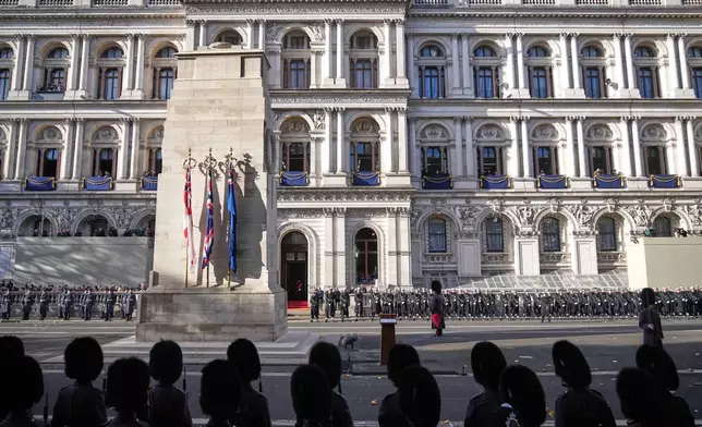 Soldiers form up on Whitehall ahead of the Remembrance Sunday service at the Cenotaph in London, Sunday, Nov. 9, 2025.(AP Photo/Alastair Grant, Pool)