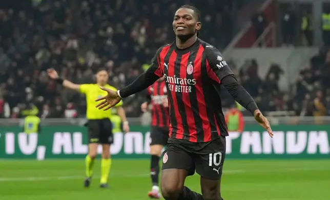 AC Milan's Rafael Leao celebrates after scoring the opening goal during the Serie A soccer match between AC Milan and Lazio, in Milan, Italy, Saturday, Nov. 29, 2025. (AP Photo/Antonio Calanni)