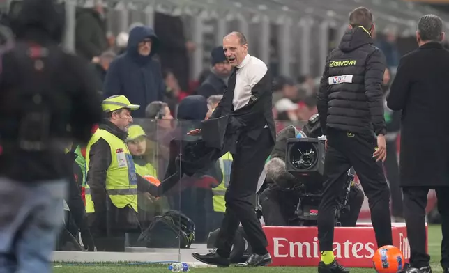 AC Milan's head coach Massimiliano Allegri gestures during the Serie A soccer match between AC Milan and Lazio, in Milan, Italy, Saturday, Nov. 29, 2025. (AP Photo/Antonio Calanni)