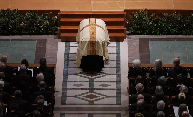 The casket of former Vice President Dick Cheney while services are held at the Washington National Cathedral, Thursday, Nov. 20, 2025 in Washington. (AP Photo/Matt Rourke)