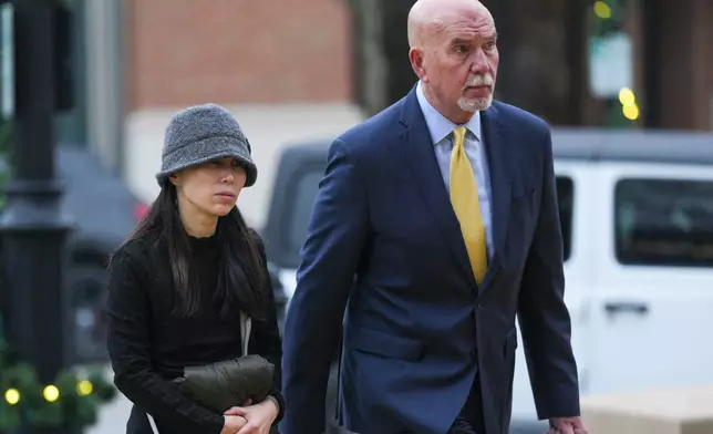 Attorney Guy Relford, right, who is representing Whitestown homeowner Curt Andersen, arrives at the Boone County Courthouse for a hearing on his clients voluntary manslaughter charge in the killing of Maria Florinda Rios Perez De Velasquez in Lebanon, Ind., Friday, Nov. 21, 2025. Following Relford is Curt Andirons wife Andersen's wife Yoshie Andersen. (AP Photo/AJ Mast)