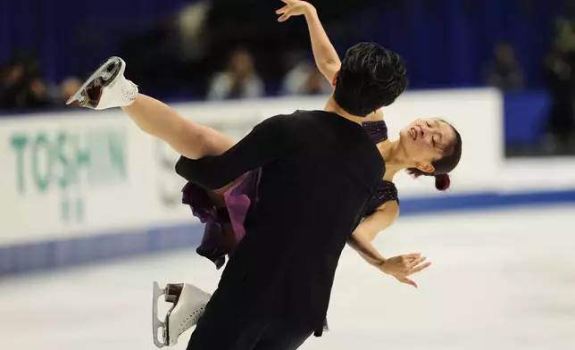 Maia Shibutani and Alex Shibutani, of the U.S., perform during the ice dance free dance program in the ISU Grand Prix of Figure Skating - NHK Trophy in Kadoma, east of Osaka, western Japan, Saturday, Nov. 8, 2025. (AP Photo/Hiro Komae)