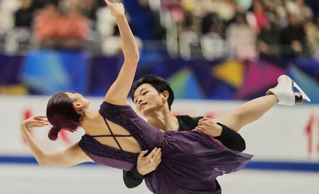 Maia Shibutani and Alex Shibutani, of the U.S., perform during the ice dance free dance program in the ISU Grand Prix of Figure Skating - NHK Trophy in Kadoma, east of Osaka, western Japan, Saturday, Nov. 8, 2025. (AP Photo/Hiro Komae)