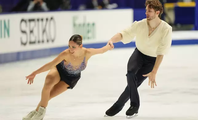 Sara Conti and Niccolo Macii, of Italy, perform during the pairs' free skating program in the ISU Grand Prix of Figure Skating - NHK Trophy in Kadoma, east of Osaka, western Japan, Saturday, Nov. 8, 2025. (AP Photo/Hiro Komae)