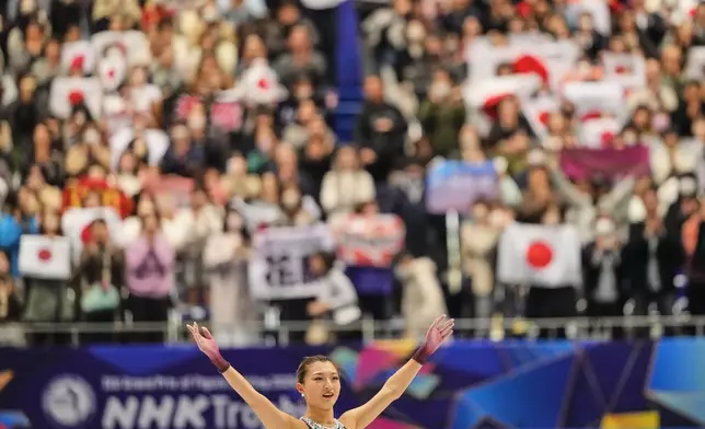 Kaori Sakamoto, of Japan, acknowledges the crowd after performing during the women' free skating program in the ISU Grand Prix of Figure Skating - NHK Trophy in Kadoma, east of Osaka, western Japan, Saturday, Nov. 8, 2025. (AP Photo/Hiro Komae)