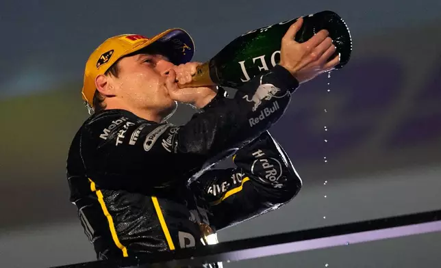 First place finisher Red Bull driver Max Verstappen of the Netherlands celebrates after the Formula One Las Vegas Grand Prix auto race, Saturday, Nov. 22, 2025 in Las Vegas. (AP Photo/John Locher)