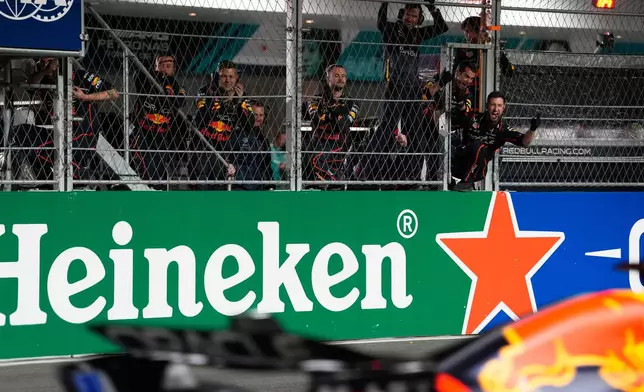 The team of Red Bull driver Max Verstappen of the Netherlands celebrates as he wins the Formula One Las Vegas Grand Prix auto race, Saturday, Nov. 22, 2025 in Las Vegas. (AP Photo/John Locher)