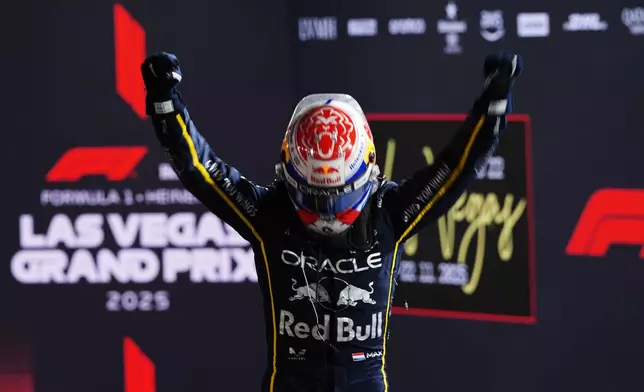 First place finisher Red Bull driver Max Verstappen of the Netherlands celebrates after the Formula One Las Vegas Grand Prix auto race, Saturday, Nov. 22, 2025 in Las Vegas. (AP Photo/Eric Gay)