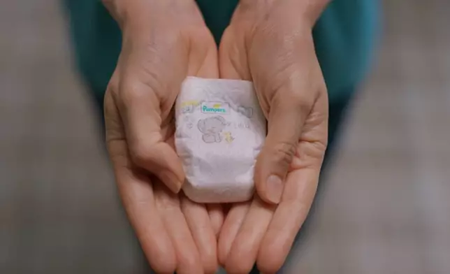 Pampers Swaddlers Size Pxxs in Hand