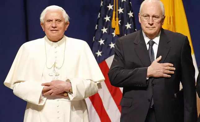 FILE - Pope Benedict XVI and Vice President Dick Cheney stand for the United States national anthem during a farewell ceremony at New York's John F. Kennedy International Airport on Sunday, April, 20, 2008, signifying the conclusion of the pontiff's trip to the United States. (AP Photo/Stuart Ramson, file)