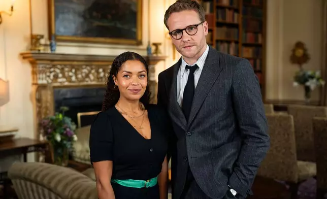 Antonia Thomas, left, and Josh Dylan appear on the set of the Agatha Christie series "Tommy &amp; Tuppence" in Beaconsfield, England on Wednesday, Oct. 29, 2025. (Photo by Scott A Garfitt/Invision/AP)