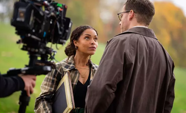 Antonia Thomas, left, and and Josh Dylan appear on the set of the Agatha Christie series "Tommy &amp; Tuppence" in Beaconsfield, England on Wednesday, Oct. 29, 2025. (Photo by Scott A Garfitt/Invision/AP)
