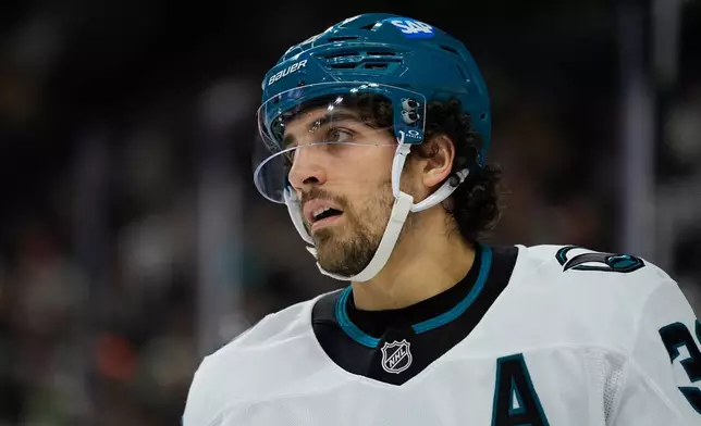 San Jose Sharks defenseman Mario Ferraro (38) looks on during the first period of an NHL hockey game against the Minnesota Wild, Tuesday, Nov. 11, 2025, in St. Paul, Minn. (AP Photo/Abbie Parr)