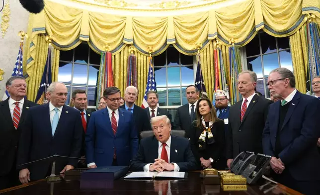 President Donald Trump speaks before signing the funding bill to reopen the government, in the Oval Office of the White House, Wednesday, Nov. 12, 2025, in Washington. (AP Photo/Jacquelyn Martin)