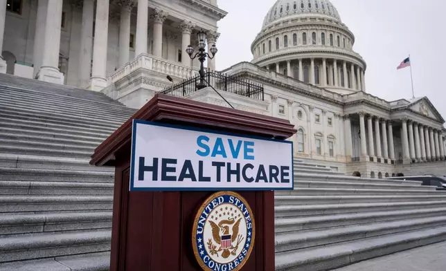 FILE - House Democrats prepare to speak on the steps of the Capitol to insist that Republicans include an extension of expiring health care benefits as part of a government funding compromise, in Washington, Sept. 30, 2025. (AP Photo/J. Scott Applewhite, File)