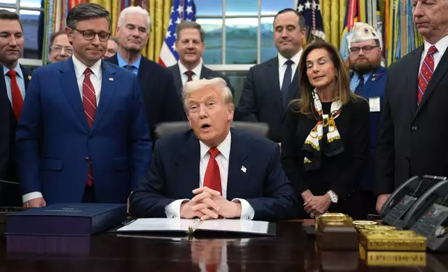 President Donald Trump speaks before signing the funding bill to reopen the government, in the Oval Office of the White House, Wednesday, Nov. 12, 2025, in Washington. (AP Photo/Jacquelyn Martin)