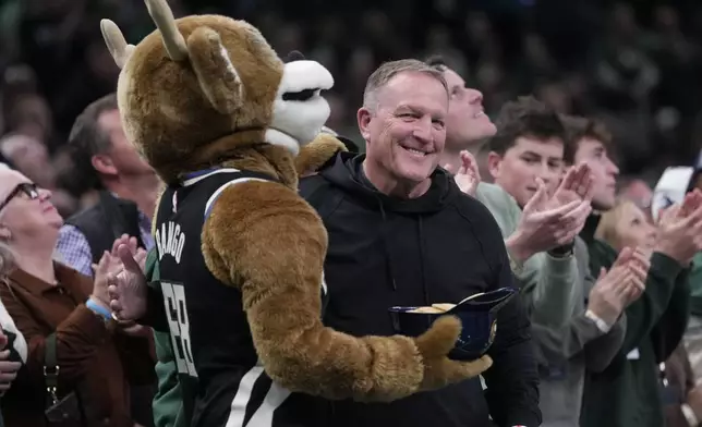 Milwaukee Brewers manager Pat Murphy is introduced during the first half of an NBA basketball game between the Milwaukee Bucks and Charlotte Hornets Friday, Nov. 14, 2025, in Milwaukee. (AP Photo/Morry Gash)