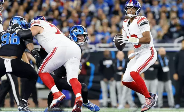 New York Giants quarterback Jameis Winston (19) looks to pass against the Detroit Lions during the first half of an NFL football game in Detroit, Sunday, Nov. 23, 2025. (AP Photo/Rey Del Rio)