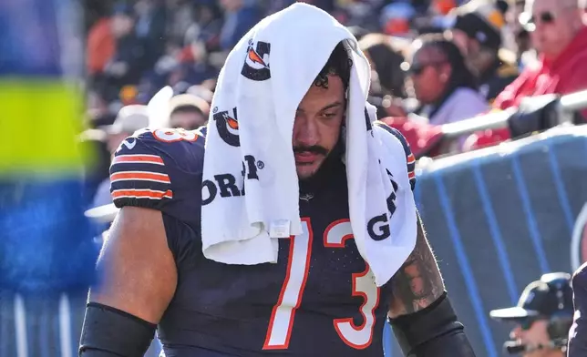 Chicago Bears guard Jonah Jackson (73) walks off the field after being injured during the first half of an NFL football game against the Pittsburgh Steelers, Sunday, Nov. 23, 2025, in Chicago. (AP Photo/Nam Huh)