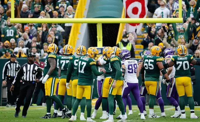 Green Bay Packers kicker Brandon McManus (17) celebrates after making a field goal during the first half of an NFL football game against the Minnesota Vikings Sunday, Nov. 23, 2025, in Green Bay, Wis. (AP Photo/Mike Roemer)