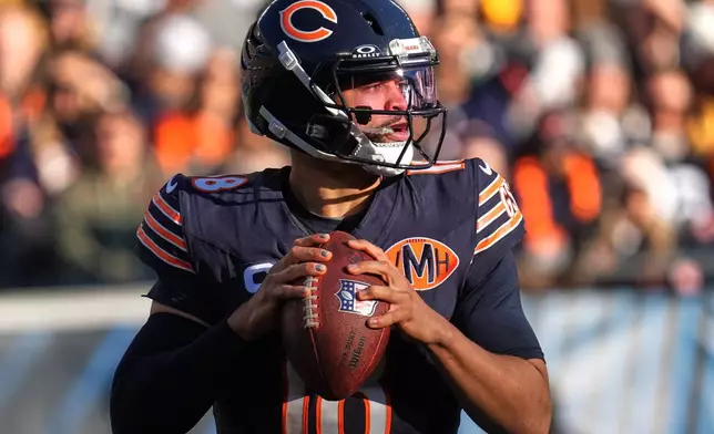 Chicago Bears quarterback Caleb Williams looks to pass the ball during the second half of an NFL football game against the Pittsburgh Steelers, Sunday, Nov. 23, 2025, in Chicago. (AP Photo/Nam Huh)
