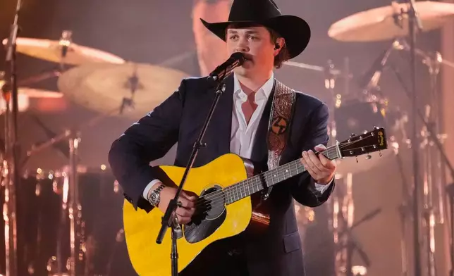 Zach Top performs "Guitar" during the 59th Annual Country Music Association Awards on Wednesday, Nov. 19, 2025, at Bridgestone Arena in Nashville, Tenn. (AP Photo/George Walker IV)