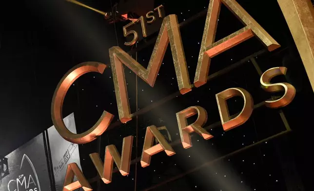 FILE - Signage for the 51st annual CMA Awards appears at the Bridgestone Arena on Nov. 8, 2017, in Nashville, Tenn. (Photo by Chris Pizzello/Invision/AP, File)