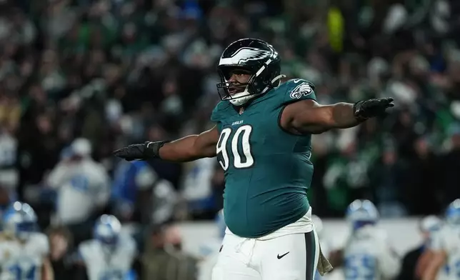 Philadelphia Eagles defensive tackle Jordan Davis (90) reacts after a Detroit Lions turn over on downs during the second half of an NFL football game Sunday, Nov. 16, 2025, in Philadelphia. (AP Photo/Matt Slocum)