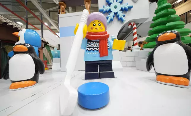 A new Thanksgiving Day float featuring Legos is displayed during a press preview of the new floats at Macy's Parade Studio in Moonachie, N.J., Tuesday, Nov. 18, 2025. (AP Photo/Seth Wenig)