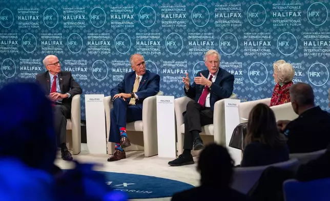 Senator Peter Welch, of Vermont, left to right, Senator Thom Tillis, of North Carolina, Senator Angus King, of Maine and moderator congresswoman Jane Harman, Commission on the National Defense Strategy, United States, take part in the Halifax International Security Forum, Saturday, Nov. 22, 2025. (Kelly Clark