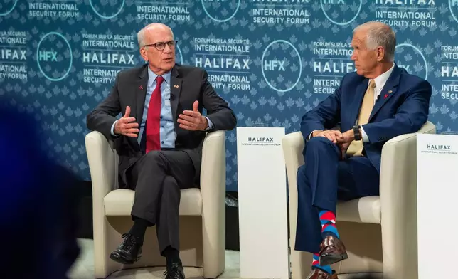 SSenator Peter Welch, D-Vt., and Senator Thom Tillis, R-N.C. take part in the Halifax International Security Forum, Saturday, Nov. 22, 2025. (Kelly Clark/The Canadian Press via AP)