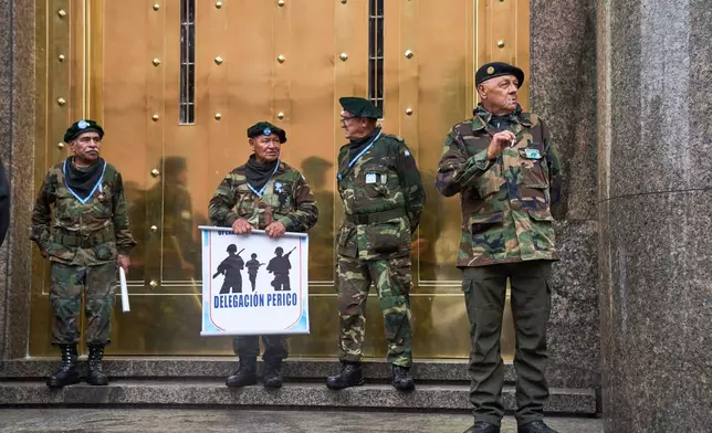 Retired military personnel gather to call for the release of former servicemen accused of human rights violations during the last dictatorship, in Buenos Aires, Argentina, Saturday, Nov. 29, 2025. (AP Photo/Rodrigo Abd)