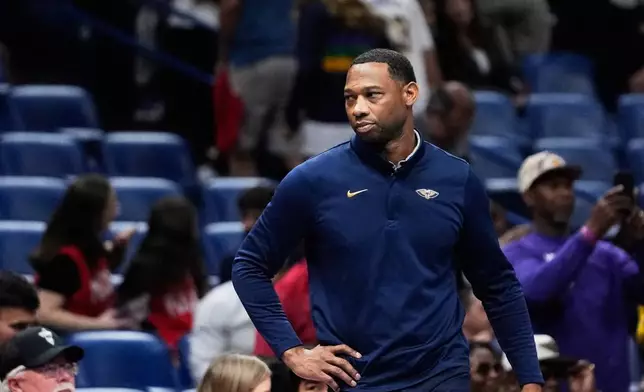 New Orleans Pelicans head coach Willie Green reacts from the bench in the second half of an NBA Cup basketball game against the Los Angeles Lakers, Friday, Nov. 14, 2025, in New Orleans. (AP Photo/Gerald Herbert)