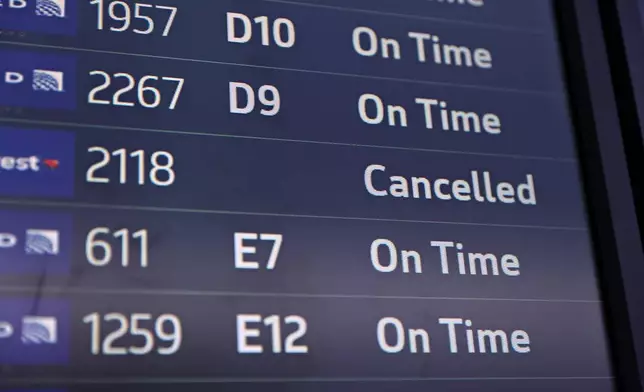 Flights are displayed at San Francisco International Airport on Friday, Nov. 7, 2025. (Gabrielle Lurie /San Francisco Chronicle via AP)