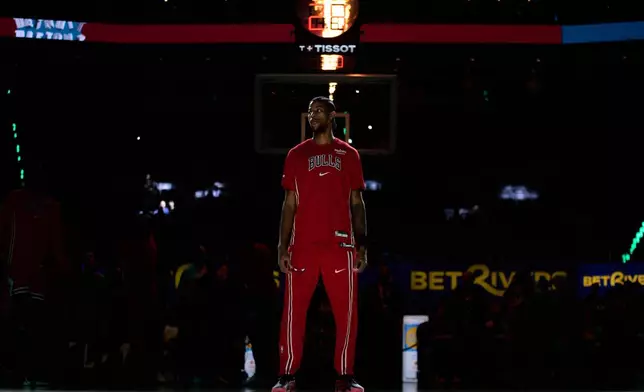 Chicago Bulls forward Dalen Terry stands on the court before an NBA basketball game against the Detroit Pistons, Wednesday, Nov. 12, 2025, in Detroit. (AP Photo/Ryan Sun)