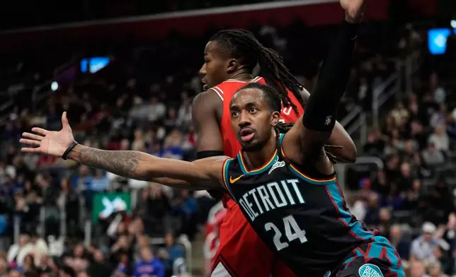Detroit Pistons guard Daniss Jenkins reacts during the first half of an NBA basketball game against the Chicago Bulls, Wednesday, Nov. 12, 2025, in Detroit. (AP Photo/Ryan Sun)