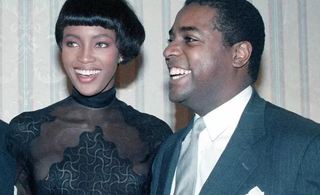 FILE - British fashion model Naomi Campbell appears with fashion designer Jeffrey Banks before the showing of collections by 13 black fashion designers in New York on Aug. 18, 1989. (AP Photo/Ed Bailey, File)