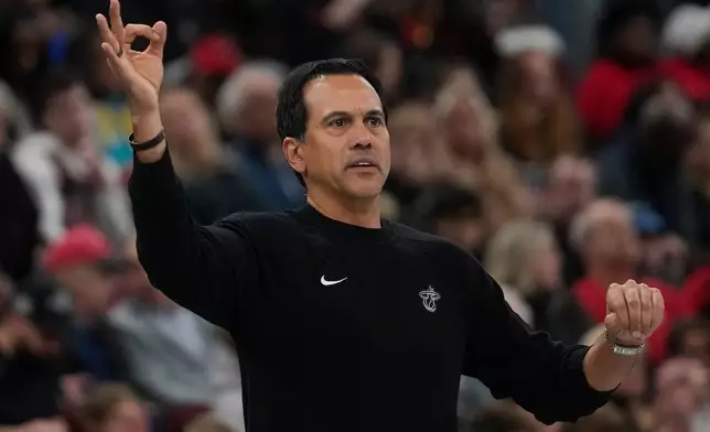Miami Heat head coach Erik Spoelstra stands on the sideline during the first half of an NBA Cup basketball game against the Chicago Bulls, Friday, Nov. 21, 2025, in Chicago. (AP Photo/Erin Hooley)