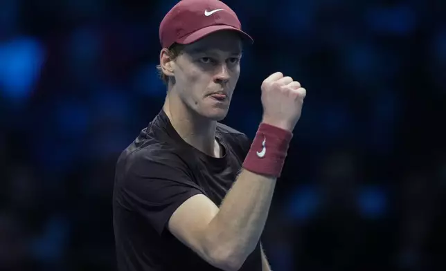 Italy's Jannik Sinner reacts during semifinal tennis match of the ATP World Tour Finals against Australia's Alex de Minaur, in Turin, Italy, Saturday, Nov. 15, 2025. (AP Photo/Antonio Calanni)