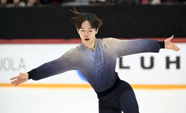 Yuma Kagiyama of Japan performs in Men's free skating Program during figure skating ISU Grand Prix in Helsinki, Finland, Saturday Nov. 22, 2025. (Mikko Stig/Lehtikuva via AP)