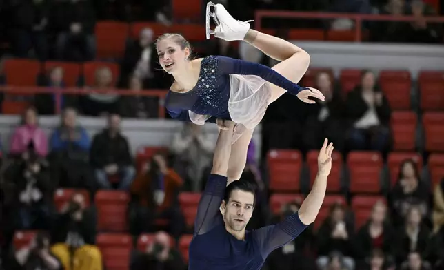 Minerva Fabienne Hase and Nikita Volodin of Germany perform in Pairs Free Program during figure skating ISU Grand Prix in Helsinki, Finland, Saturday Nov. 22, 2025. (Mikko Stig/Lehtikuva via AP)