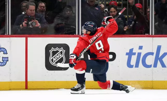 Washington Capitals right wing Ryan Leonard (9) celebrates his goal during the second period of an NHL hockey game against the Edmonton Oilers, Wednesday, Nov. 19, 2025, in Washington. (AP Photo/Nick Wass)