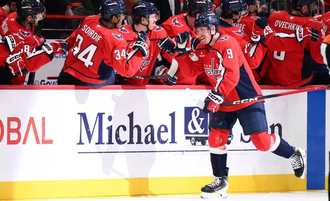 Washington Capitals right wing Ryan Leonard (9) celebrates his goal during the second period of an NHL hockey game against the Edmonton Oilers, Wednesday, Nov. 19, 2025, in Washington. (AP Photo/Nick Wass)